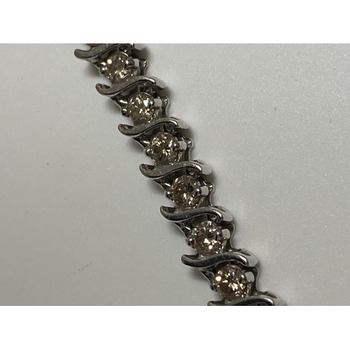 66 - 14K white gold and diamond bracelet stamped 14k, approx total diamonds 2CT