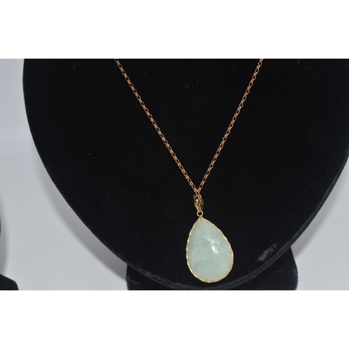 67 - Two gold and jade/jadeite necklaces