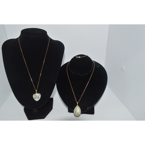 67 - Two gold and jade/jadeite necklaces