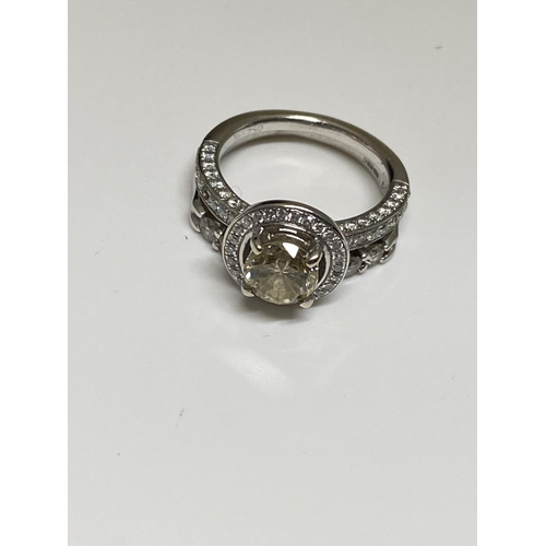 131 - A 18ct white gold and diamond (yellow) ring stamped 18k 750 together with 14ct white gold diamond et... 