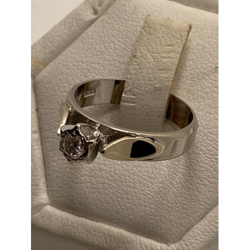 213 - 18ct gold white gold solitaire diamond  ring, approx 0.20ct, hallmarked 750 London, approx size L, a... 