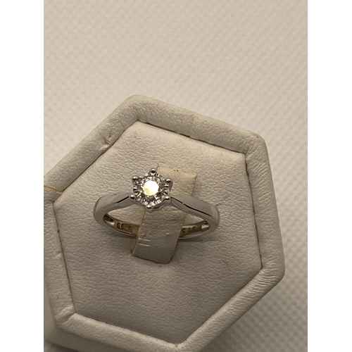 214 - Brand new 9ct gold white gold solitaire diamond engagement ring, 0.33ct, stamped 375, approx size N