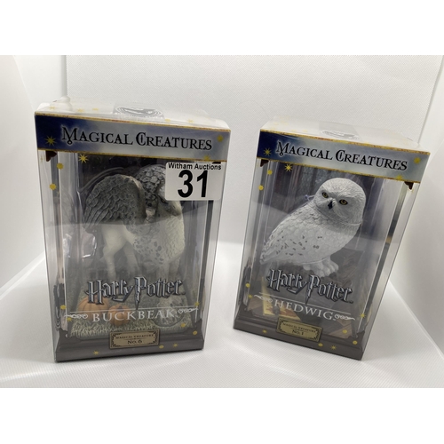 31 - Two boxed Warner Brothers Harry Potter  Magical Creatures figures no.1 ‘Hedwig’ and  no.6 ‘Buckbeak’... 