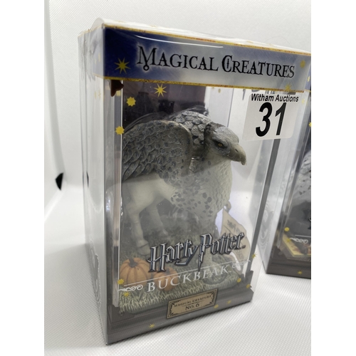 31 - Two boxed Warner Brothers Harry Potter  Magical Creatures figures no.1 ‘Hedwig’ and  no.6 ‘Buckbeak’... 