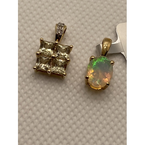 50 - Gold and Opal pendant, marked 10k 417 with tag indicating made in India and one other 10k pendant wi... 