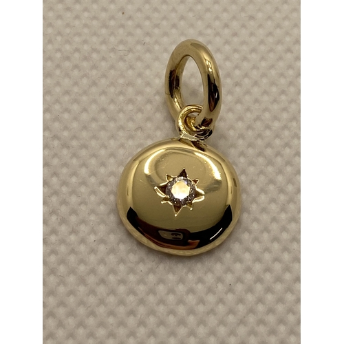 70 - 18ct gold pendant with diamond to centre, not hallmarked, approx gross weight 5g