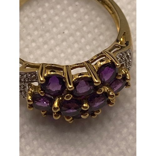 74 - A 9ct yellow gold with purple stone (poss amethyst) cluster ring, hallmarked Birmingham QVC, approx ... 