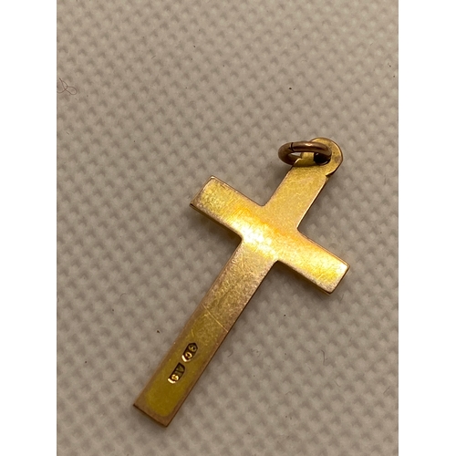 216 - A 9ct yellow gold cross pendant (approx 3.5cm in length) together with 9ct gold heart shaped pendant... 