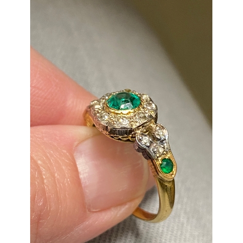 94 - Vintage 18 ct yellow gold diamond and green stone ring, the central green circular stone surrounded ... 