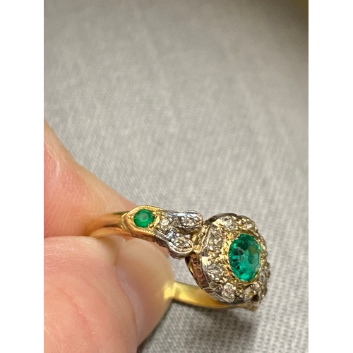 94 - Vintage 18 ct yellow gold diamond and green stone ring, the central green circular stone surrounded ... 