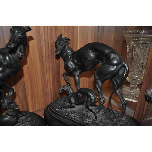 1 - Two spelter figures in the form of  greyhounds on ebonised bases, A/F