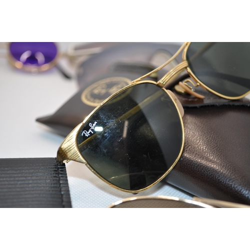 104 - A variety of retro sunglasses in different shapes and colours including a pair of retro gold-coloure... 