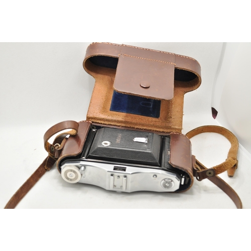 12 - A Zeiss Icon Nettar lens folding camera in real hide carry case