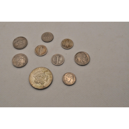 184 - A mixture of coins to include silver American coins including a 1943 walking liberty half dollar