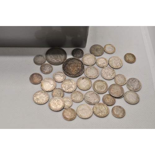 189 - A mixture of British and overseas coins and notes to include some silver coins