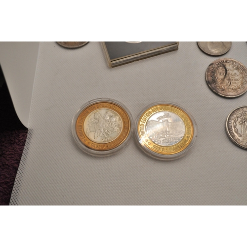 190 - A mixture of American coins, tokens (some silver) and two commemorative sets 1901 Morgan dollar. A/F... 