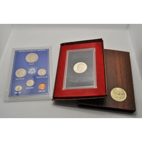 190 - A mixture of American coins, tokens (some silver) and two commemorative sets 1901 Morgan dollar. A/F... 