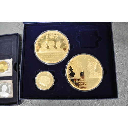 191 - Commemorative gold plated encapsulated jumbo medallions, HM Queen Elizabeth 90th birthday and Longes... 