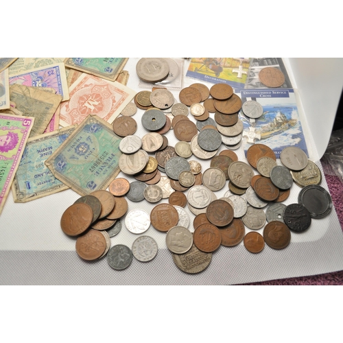 196 - A mixture of coins and notes from around the world, some silver and reproductions