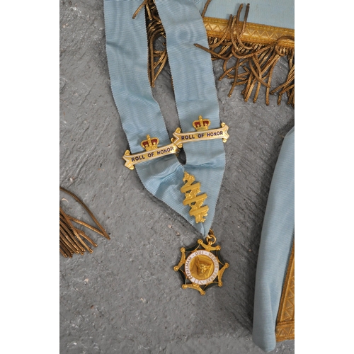 199 - Masonic items related to Grand Lodge of England to include decorated Apron, sash, cuffs and enamel b... 