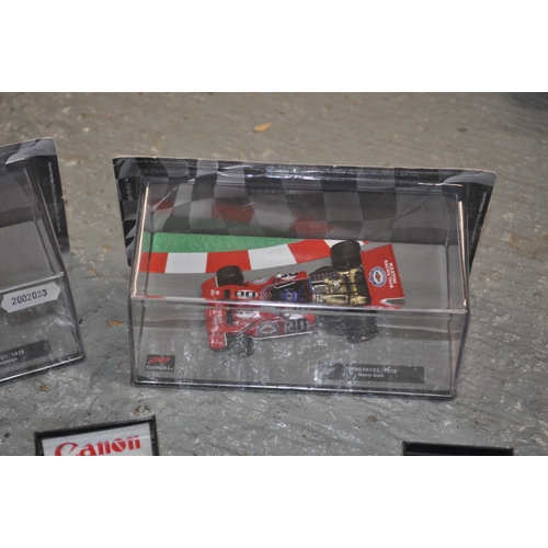 200 - Formula One model vehicle collection with magazines together with Classico collectibles, x10 vehicle... 