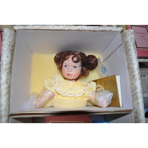 214 - Complete set of Franklin Heirloom dolls (Franklin Mint); Monday's Child, Tuesday's Child, Wednesday'... 