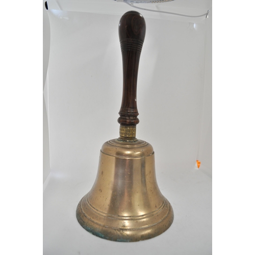 22 - 'Rare' heavy brass hand bell by Evans Sons & Co of London Bridge. Overall height approx 35cm.