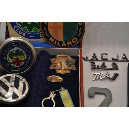 225 - A collection of motoring memorabilia items including Alfa-Romeo owners club items alongside other mo... 