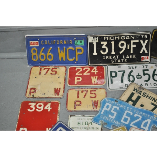 227 - Retro/vintage metal plates to include American/North American vehicle plates, embossed GR plates etc... 