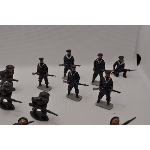 237 - Vintage diecast military figures together with seven miniature lead cast battleships A/F