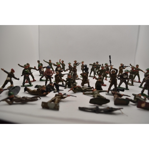 238 - Predominately diecast military soldiers of various nationalities, some with weapons and different st... 