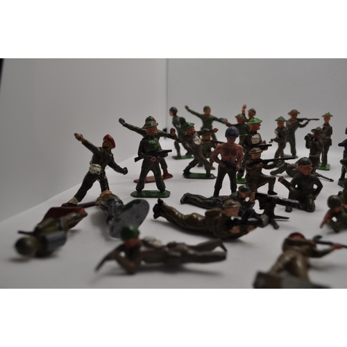 238 - Predominately diecast military soldiers of various nationalities, some with weapons and different st... 