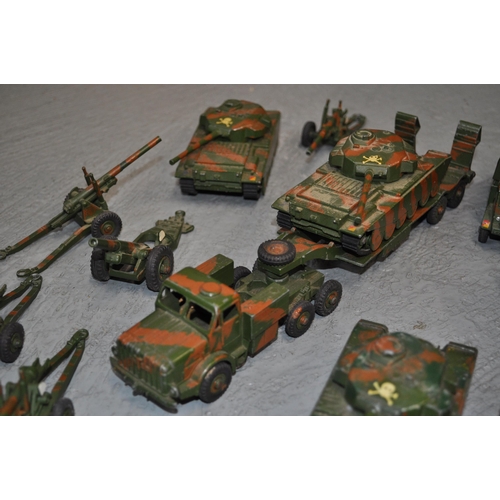 239 - A large selection of Dinky metal army vehicles to include; x3 651 centurion tanks, x1 623 wagon, x1 ... 