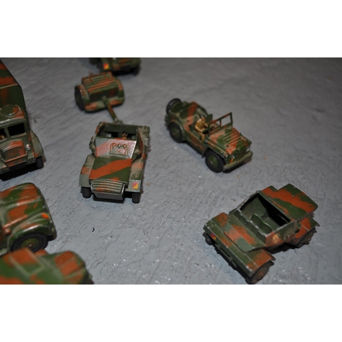 239 - A large selection of Dinky metal army vehicles to include; x3 651 centurion tanks, x1 623 wagon, x1 ... 