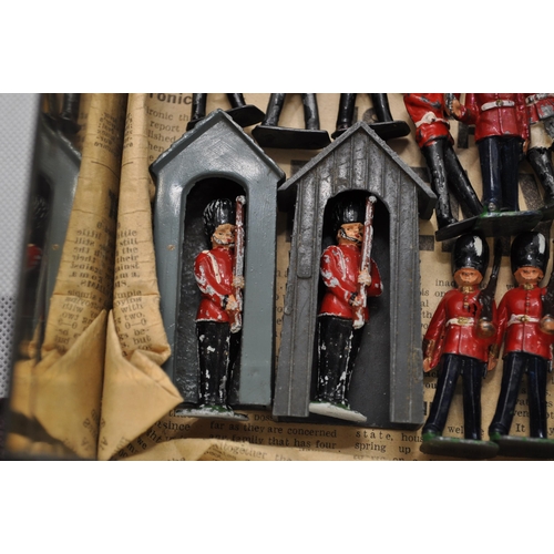 245 - Diecast military British guardsman In parade dress, guards on sentry duty, bandsman, Canadian and ot... 