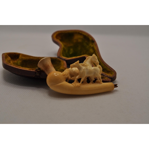 52 - Meerschaum pipe with carved horses design, in case.