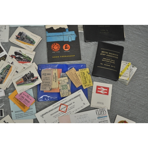 77 - A collection of railway related items including model train decals, old railway tickets, Hardback bo... 