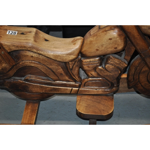 128 - A bespoke wooden child's rocker in the form of a motorcycle, approx H72cm x L100cm, x W38cm