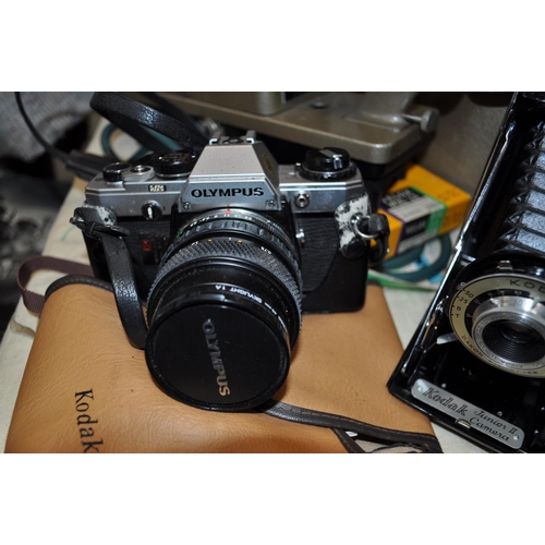 13 - Olympus OM10 Camera with 35-70mm lens, together with Bell & Howell Macro Lens, Kodak Junior II Camer... 