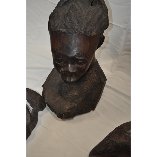 137 - Pair of African tribal masks and two hand carved wooden busts in the form of woman and child A/F