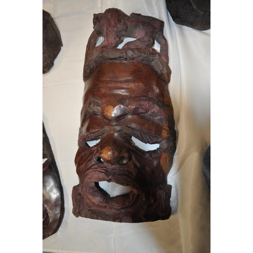 137 - Pair of African tribal masks and two hand carved wooden busts in the form of woman and child A/F