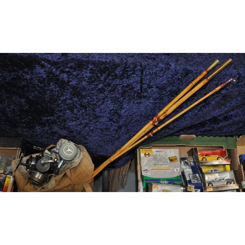 144 - A split cane rod with a selection of different reels including makes such as, Mitchell, Daiwa, along... 