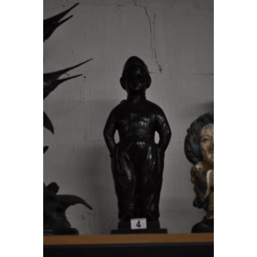 4 - Cast metal doorstop/fireside companion in the form of a boy in vintage attire