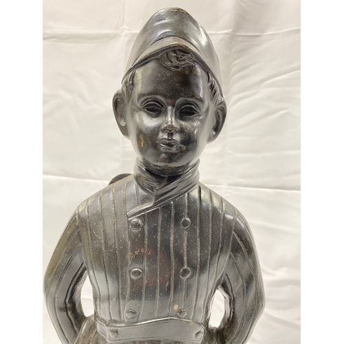 4 - Cast metal doorstop/fireside companion in the form of a boy in vintage attire