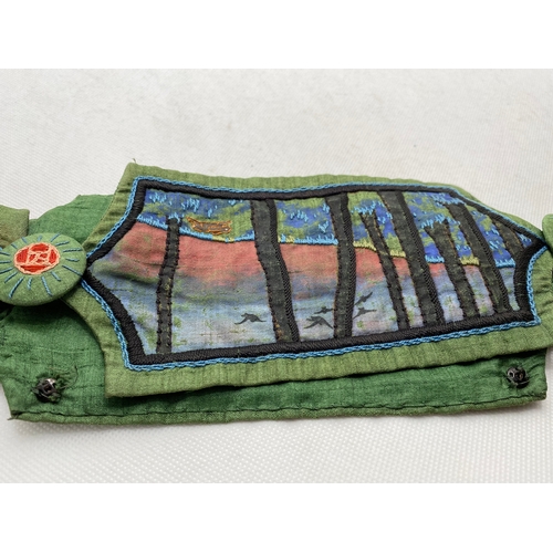 79 - A belle époque-style belt, green dupion silk with an embroidered landscape scene to each panel, repu... 