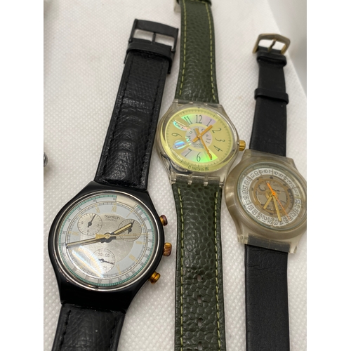 114 - A selection of Swatch watches, predominately 1990’s era some with leather straps, automatic, chrono ... 