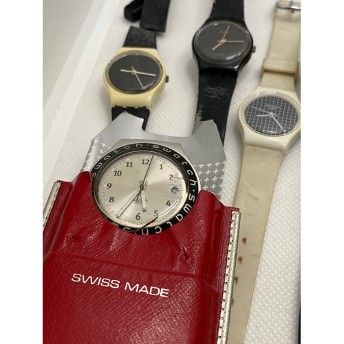 114 - A selection of Swatch watches, predominately 1990’s era some with leather straps, automatic, chrono ... 