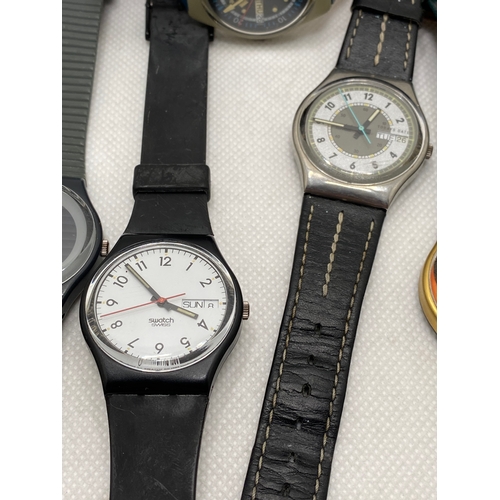 114 - A selection of Swatch watches, predominately 1990’s era some with leather straps, automatic, chrono ... 