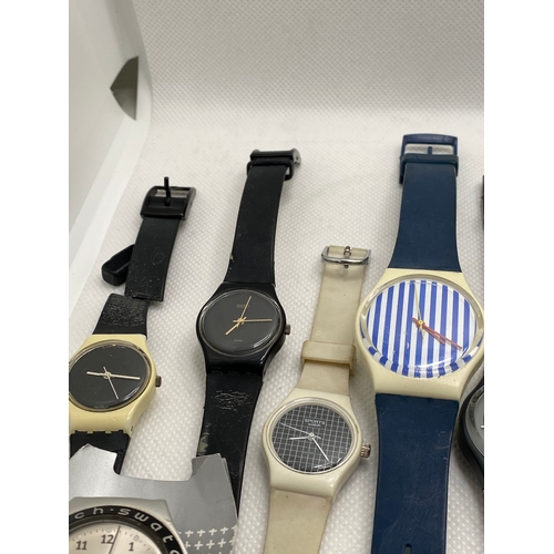 114 - A selection of Swatch watches, predominately 1990’s era some with leather straps, automatic, chrono ... 