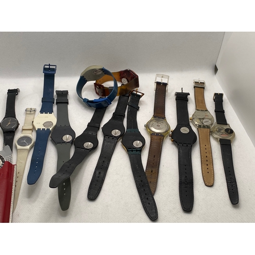 114 - A selection of Swatch watches, predominately 1990’s era some with leather straps, automatic, chrono ... 